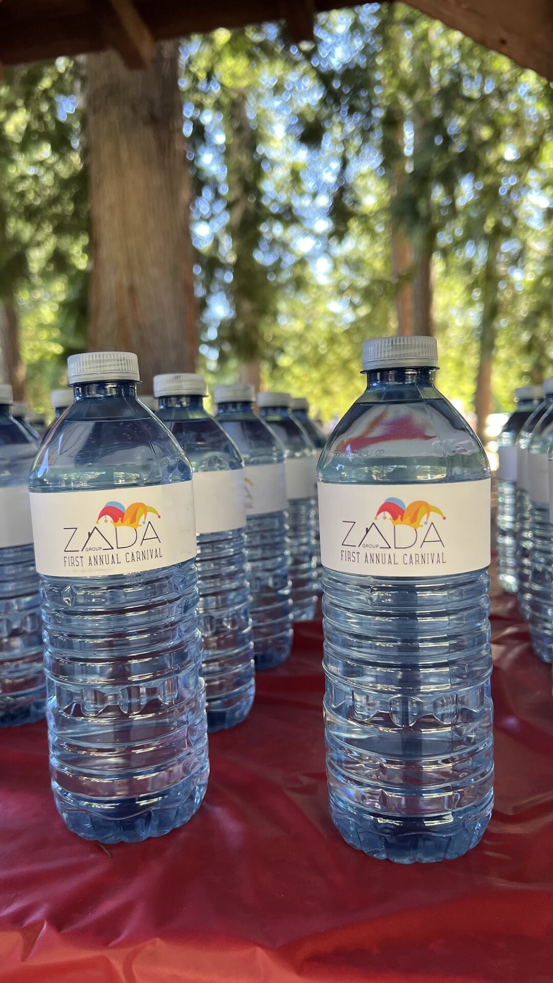 Custom-labelled water bottles for the Zada Group community event